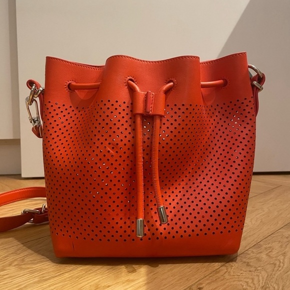 Proenza Schouler Handbags - 🎉HP🎉Rare Proenza Schouler Perforated Bucket Bag w Pouch EUC